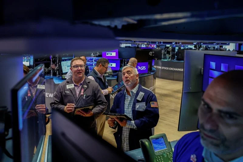 Nasdaq hits record close as AI optimism returns, Treasury yields slide